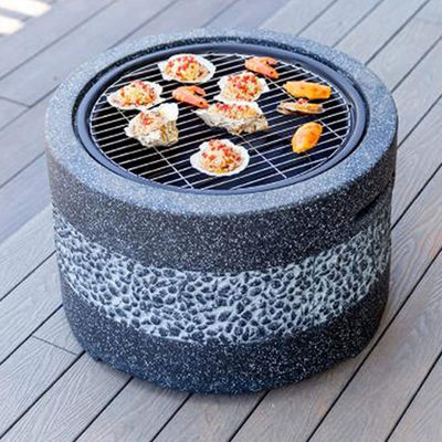 외관 뒷마당 정원 불덩어리 인위 돌과 석탄 BBQ 그릴